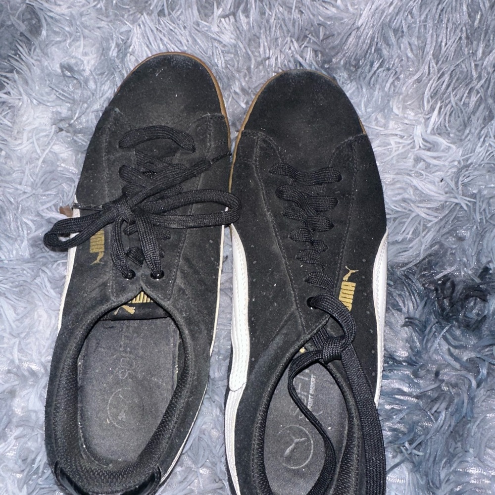 Puma Black and Gold Sneakers